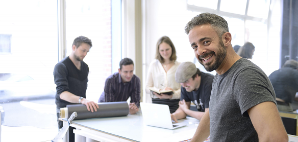 Advertising agency owner and his team