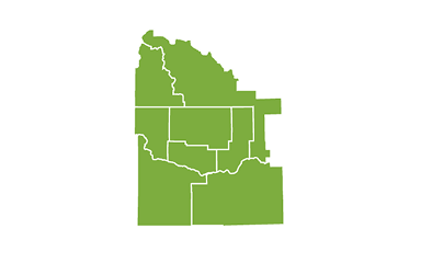 Bright green regional map of South Central Idaho highlighting Blaine, Camas, Cassia, Gooding, Jerome, Lincoln, Minidoka, and Twin Falls counties.